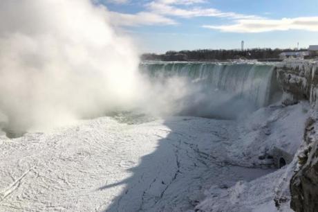 Parts of Niagara Falls have frozen over in a stunning winter spectacle