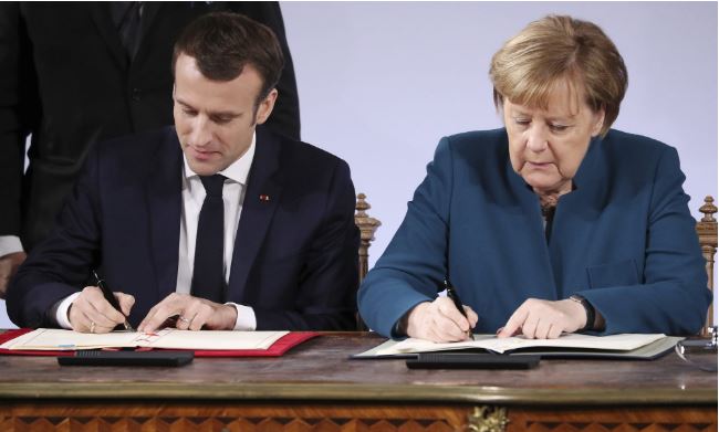 France, Germany strengthen treaty ties to tackle EU crisis