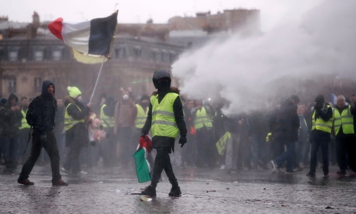 Yellow vest protests hit with police water cannon, tear gas in Paris