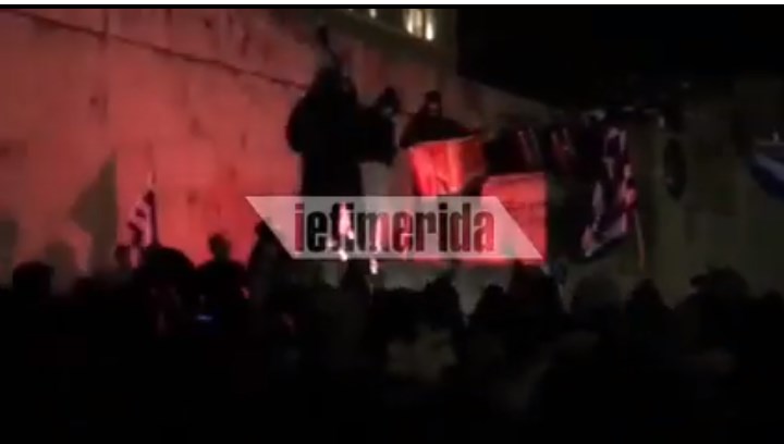Greek nationalists burn Macedonian flag in front of the Parliament