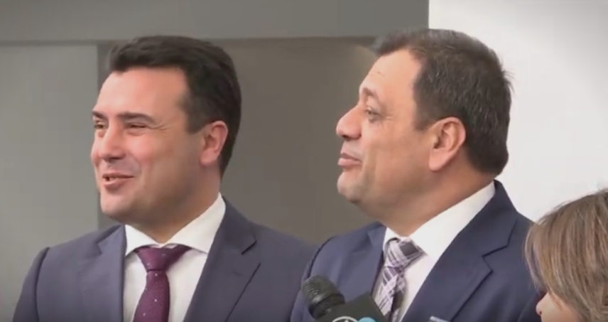 Angjushev calls the country the Republic of Macedonia, Zaev corrects him, and his face flushes with laughter