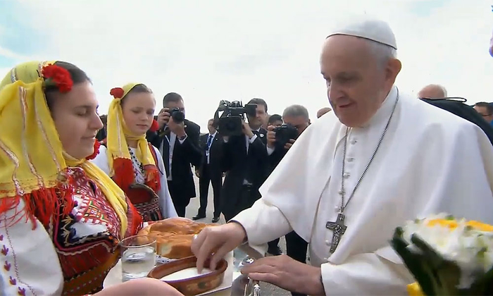 Pope Francis traditionally welcomed with bread and salt at Skopje airport