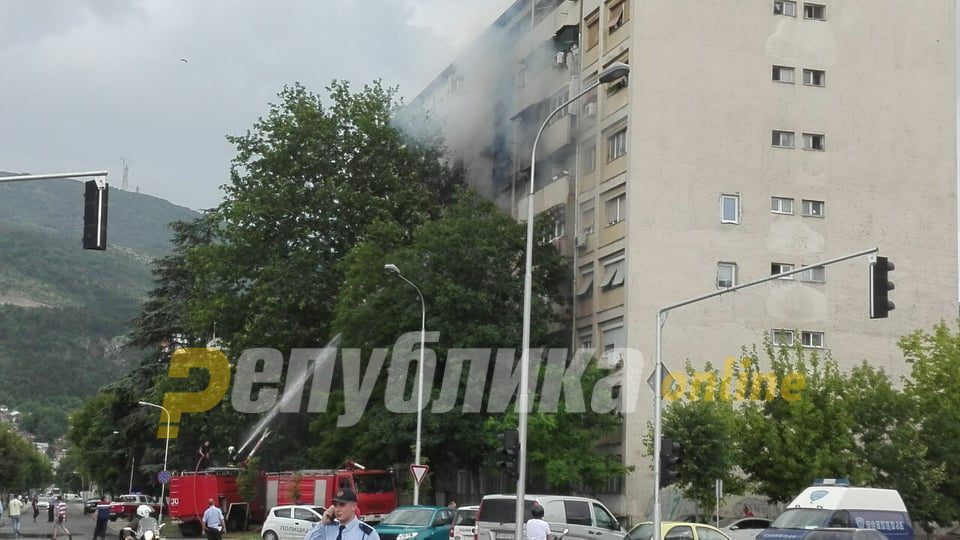 Firefighters save children from a burning building in Skopje