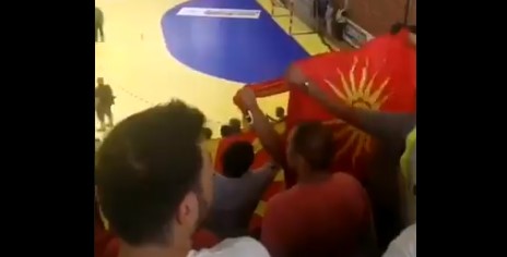 Fan refuses to give up the Kutles flag during the Macedonia – Greece game