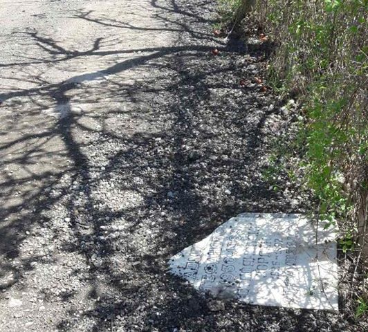 Tombstone used to pave a street in the village of Volkovo near Skopje