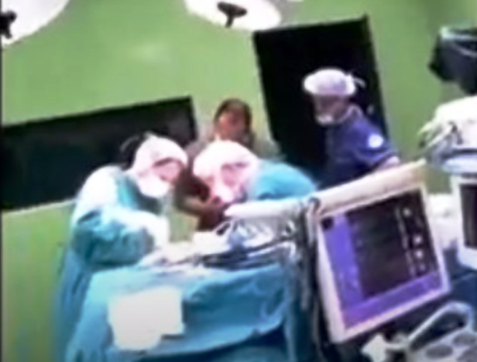 Opposition parties call on Filipce to resign after video shows him maskless in a operating room