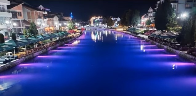 Struga illuminates the Crn Drim river pink in display of pre-election kitsch