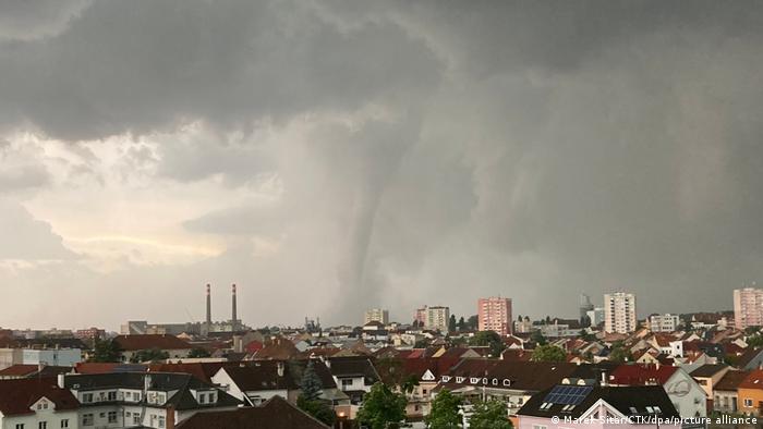 Rare tornado hits south-east Czech Republic, razing houses and injuring dozens