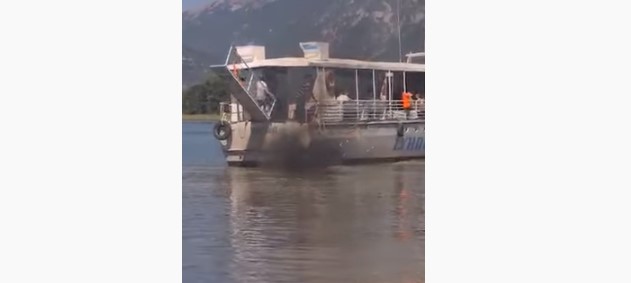 Boat carrying tourists runs aground near the St. Naum port