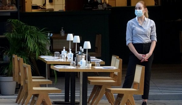 Starting in October, only fully vaccinated people will be allowed into cafes and restaurants