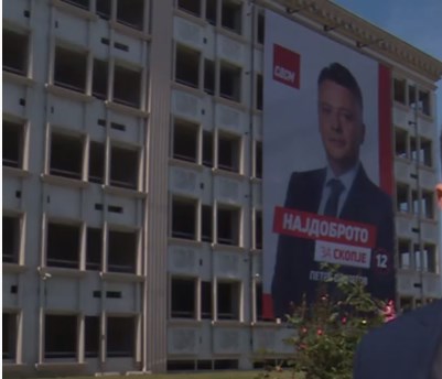 Mayor Silegov uses a building from the Skopje 2014 project for a North Korean style election billboard