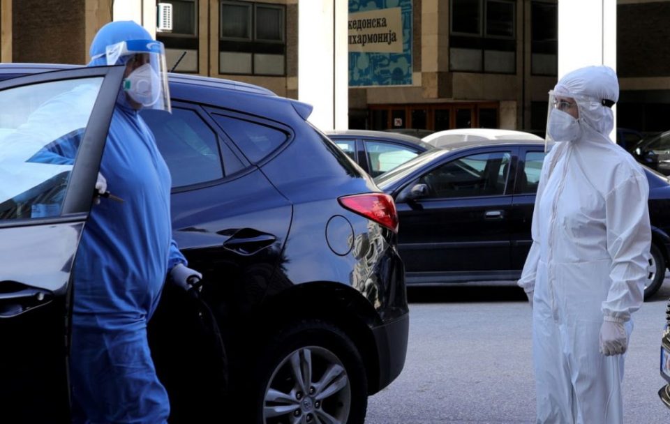 Two MPs who are in isolation arrived at the Parliament building in hazmat suits