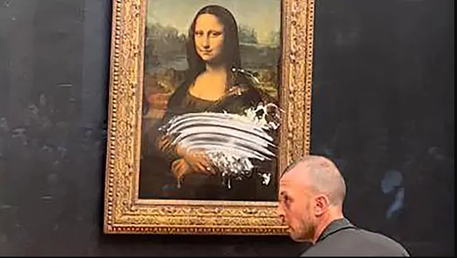 Mona Lisa gets caked by man disguised as old woman at the Louvre