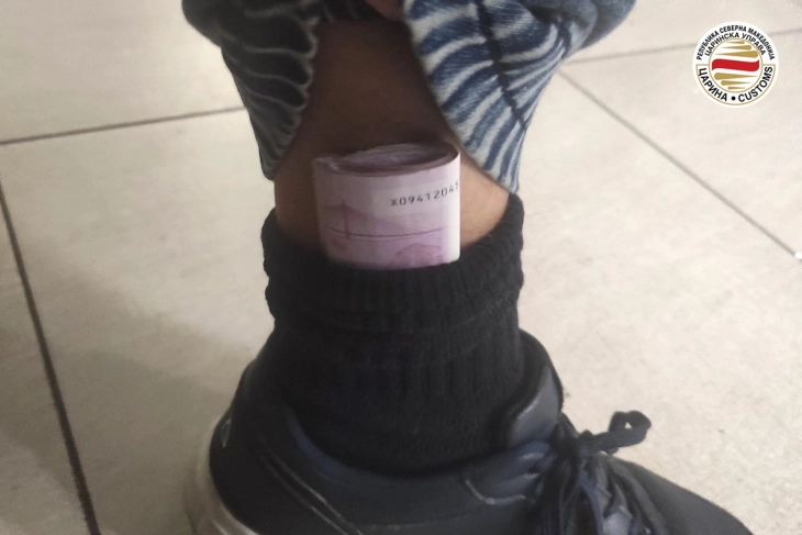 Customs officers have confiscated money concealed within socks