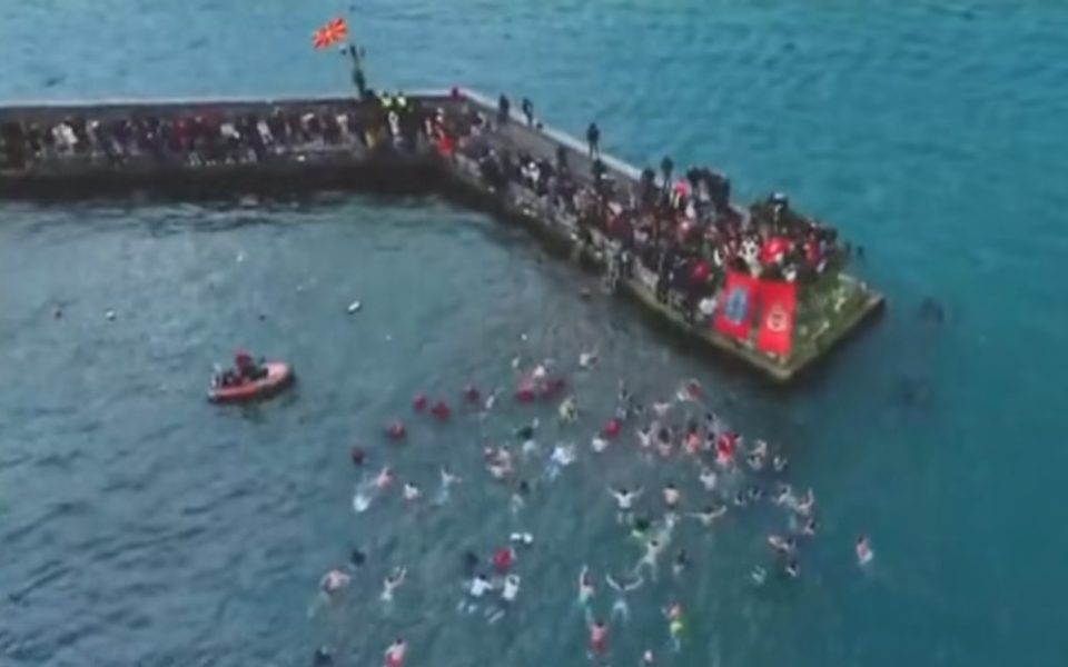 Nikola Jakimoski successfully retrieves the cross from Lake Ohrid