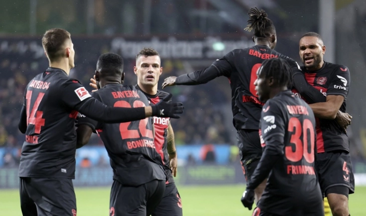 Stanisic preserves Leverkusen’s unbeaten streak in draw against Dortmund